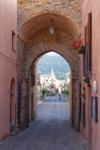 Passageway to the historic centre of the Sicilian town of Castelbuono. Sicily, Italy, Southern