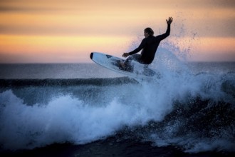 Bells Beach, Australia, January 30 2017: Surfers in action at the iconic Bells Beach on a summer