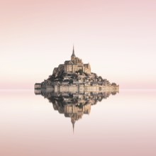 Perfect reflection of Mont Saint Michel, probably the most famous monastery mountain in the world,