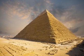 A beautiful fiery sky behind the Giza pyramid of Khafre in Cairo, Egypt, Africa