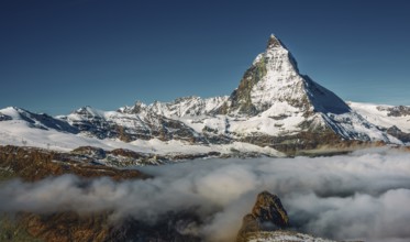 View of the Matterhorn above the clouds