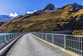 Road on the dam wall of the Moiry reservoir, near Grimentz, Val d'Anniviers, Valais Alps, Canton