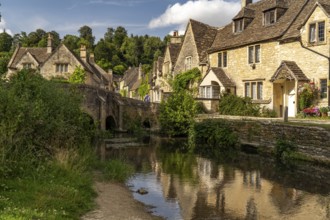 The village of Castle Combe on the River Bybrook, Cotswolds, Wiltshire, England, Great Britain