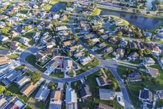 Aerial view of a new housing estate with houses in Buenaventura Lakes, Orlando, USA, North America