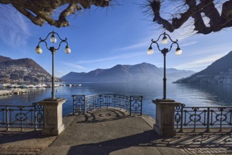 Lake, lakeside promenade, lanterns, trees, railings, mountains, haze, shadow, backlight, Lake