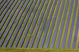 Dortmund, North Rhine-Westphalia, Germany, Deusenberg solar park. The ground-mounted system is