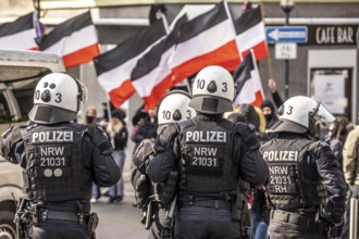 The neo-Nazi group Jung und Stark, JS, demonstrates in the city centre of Essen, demanding the