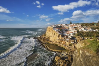 Scenic view of the seaside Azenhas do Mar fishing village on cliff on Atlantic ocean coast,