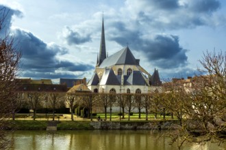 Nemours. Saint-Jean-Baptiste church on river Loing. Seine-et Marne department. Ile-de-France.