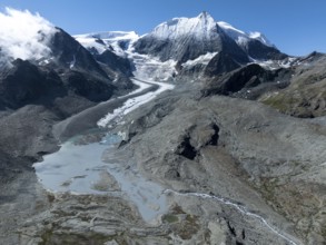 Aerial view, Alpine panorama, mountain landscape with glacier tongue and glacier lake, Glacier de