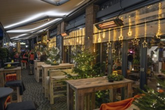 Christmas decoration in the pedestrian zone at a restaurant, Lüneburg, Lower Saxony, Germany,