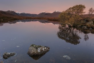 Mountains reflected in lake, morning light, morning mood, still, autumn, snowy, Lochan na