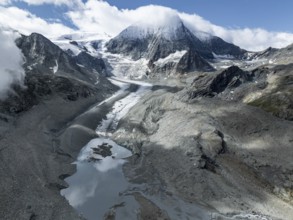 Aerial view, mountain landscape with glacier tongue Glacier de Cheilon and summit Mont Blanc de