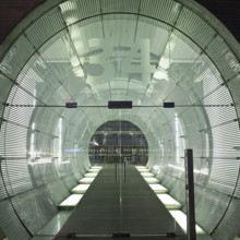 Illuminated, tubular entrance to the EnergieForum Berlin, Friedrichshain, Berlin, Germany, Europe