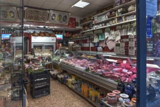 Grocery shop with meat counter in the historic centre, Genoa, Italy, Europe