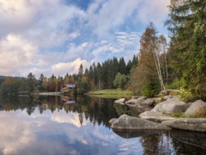 Autumn evening at Lake Fichtelsee, shore with large boulders, Fichtelgebirge, Upper Franconia,