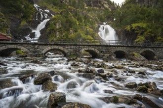 Låtefossen waterfall with bridge, Latefossen, Odda, Vestland, Norway, Europe