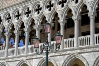 Venetian lantern in front of the Doge's Palace, San Marco district, Venice, Veneto region, Italy,