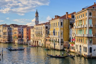 VENICE, ITALY, JUNE 27, 2018: Grand Canal with boats and gondolas on sunset, Venice, Italy, Europe