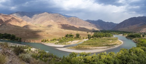 Green river valley with Naryn river between mountains, mountain landscape near Kazarman, Naryn