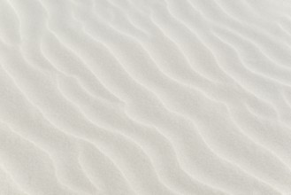 Sand drifts, wave structures in light-coloured sand, background image, North Sea, Juist, East