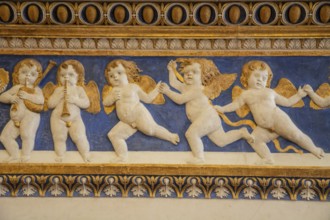 Mantelpiece with angel figures in Palazzo Ducale, Unesco world heritage site Urbino, Urbino and