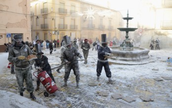 Els Enfarinats flour fight, rebels, armed with flour, eggs and firecrackers, take over the regiment