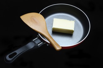A knob of butter in a pan