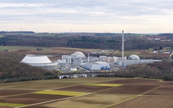 The decommissioned Neckarwestheim nuclear power plant lies in the middle of vast fields and forests