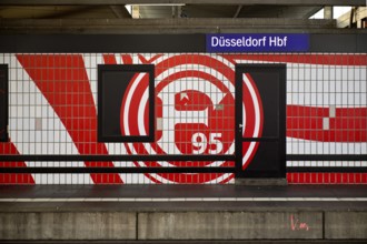 Large logo in club colours of Fortuna Düsseldorf on a wall with tiles, Düsseldorf Central Station,