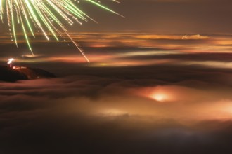 New Year's Eve fireworks 2024 and a little red Aurora Borealis Northern Lights. On the
