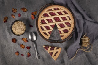 Top view of homemade pie called 'Linzer Torte', a traditional Austrian shortcake pastry topped with