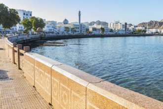 The main road Corniche leads along in an arc to the Bay of Mutrah, Muscat, Arabian Peninsula,