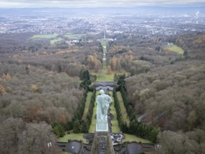 Copper statue of Hercules in Bergpark Wilhelmshöhe with a view over Wilhelmshöhe Palace and