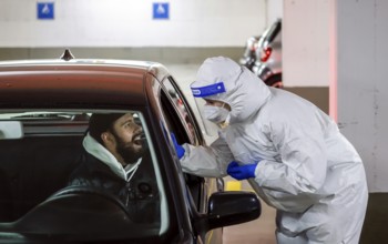 Cologne, North Rhine-Westphalia, Germany - Covid rapid test in a car park, at the Medicare test