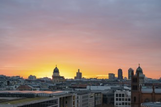City view at sunset, Friedrichswerder Church, behind German Cathedral and French Cathedral, view