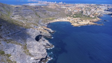 Aerial view of la manga del mar menor with its crystal clear turquoise waters gently lapping