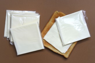 Cheese slices with toast, processed cheese in packaging