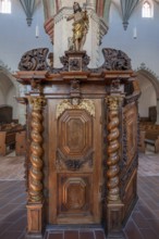 Figure of Jesus with the Lamb of God on the chancel entrance in the church of St Martin, Memmingen,