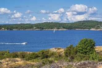 Landscape with boats on the island of Merdø in Norway