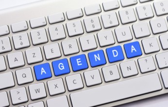 AGENDA writing on white keyboard
