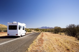 Campervan travelling on 1'Namatjira Drive near Mt Zeil in Northern Territory, Australia, Oceania