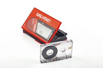 WETZLAR, Germany: 2022-04-16: Beautiful red vintage SONY WALKMAN WM-24 with audio tape over bright