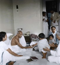 Mahatma Gandhi playing with child, Birla House, Mumbai, Maharashtra, India, Asia, June 1945, Asia