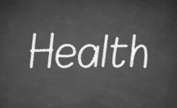 Health lesson on blackboard or chalkboard. written in white chalk