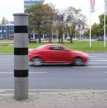 Berlin, Germany, October 13, 2022, speed camera column at Ernst-Reuter-Platz with passing blurred