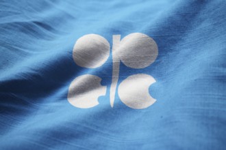 Closeup of Ruffled Organization of the Petroleum Exporting Countries Flag, OPEC Flag Blowing in