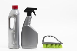 arrangement with detergent bottles brush