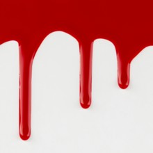 Red dripping paint white background