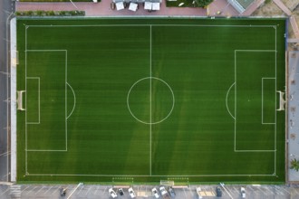 Aerial photographic documentation of an empty green football pitch